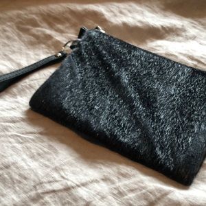 Funky furry black clutch bag